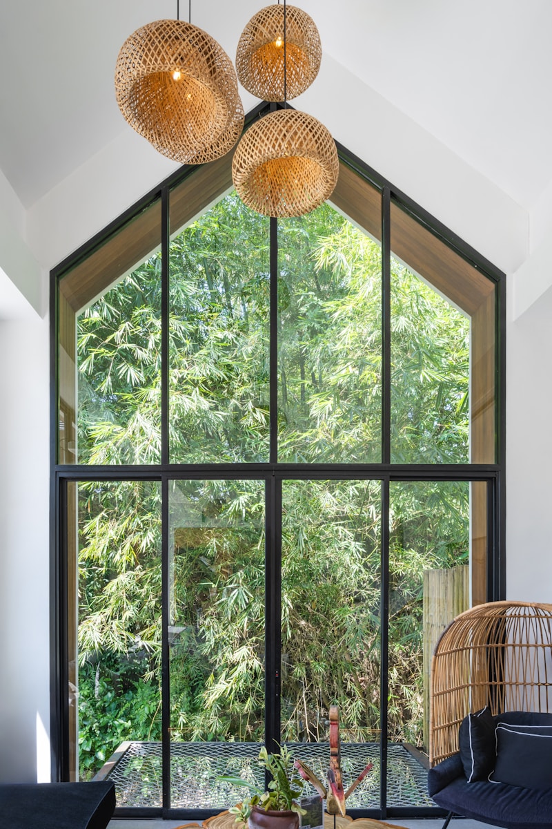 A living room filled with furniture and a large window